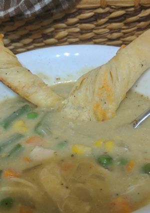 A picture of Chicken Pot Pie with Puff Pastry Cheese Sticks.