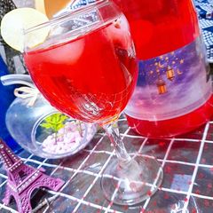 A picture of Red Sharbat with Lemon.