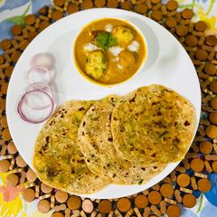 A picture of PANEER MALAI KOFTA,STUFF DRY FRUITS With POTATO ROTI.