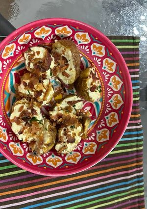Una foto de Papas con sour cream