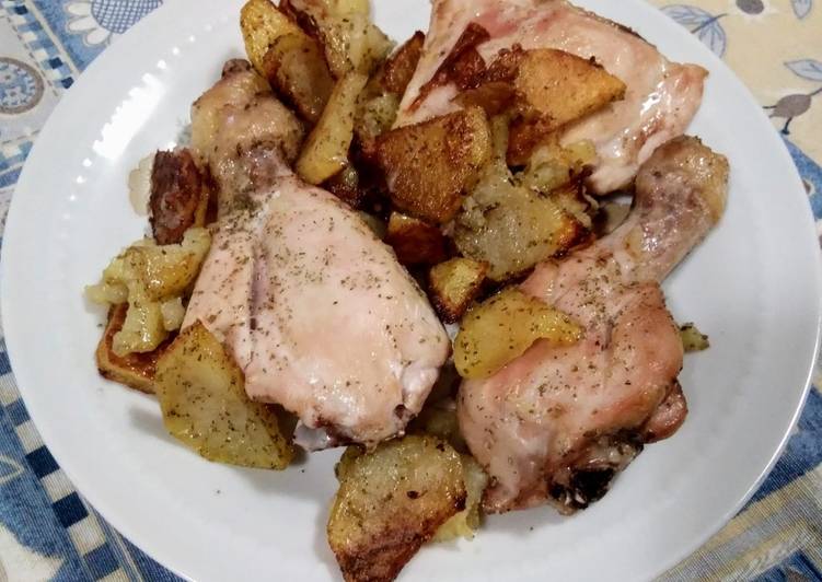 Cosce di pollo e patate al forno