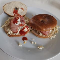 A picture of Thin bagels with egg/bacon.
