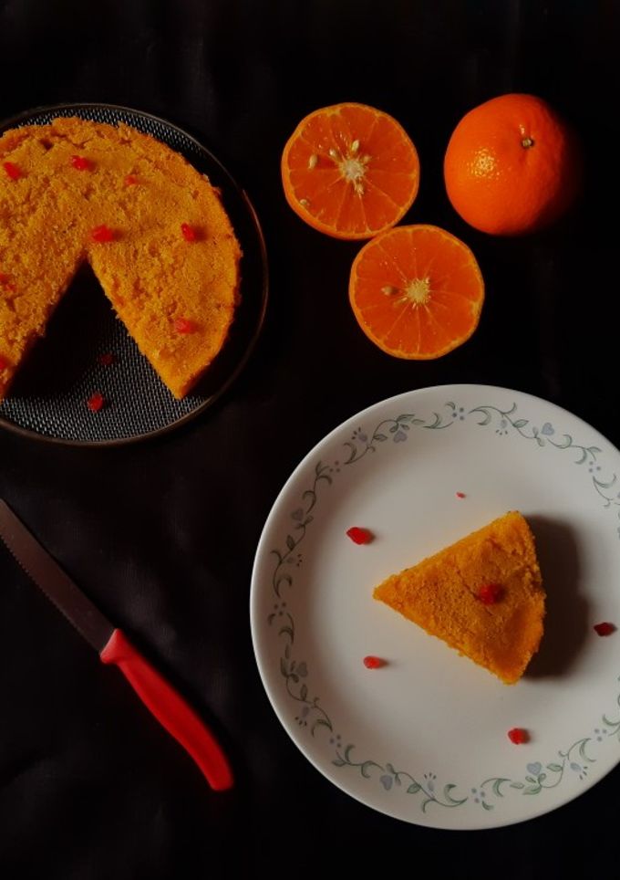 एग्गलेस ऑरेंज केक इन कड़ाई (eggless orange cake in kadai recipe in Hindi) रेसिपी मुख्य फोटो