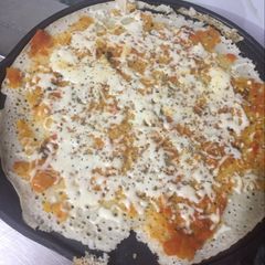 A picture of Tasty tasty dosa pizza 🍕.