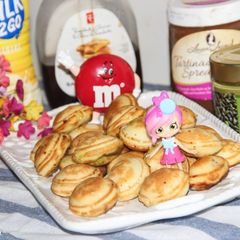 Ebelskivers With Chocolate / Chocolate Stuffed Mini Pancakes A picture of Ebelskivers With Chocolate / Chocolate Stuffed Mini Pancakes.