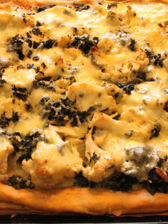 Una foto de Pastel de repollo y coliflor, a la marchanta