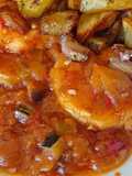 Merzluza, con calamar y pisto