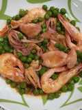 Calamari, gamberetti e piselli