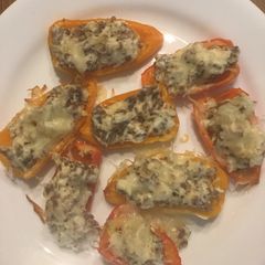 A picture of Italian sausage stuffed peppers.