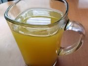 Una foto de té de naranja