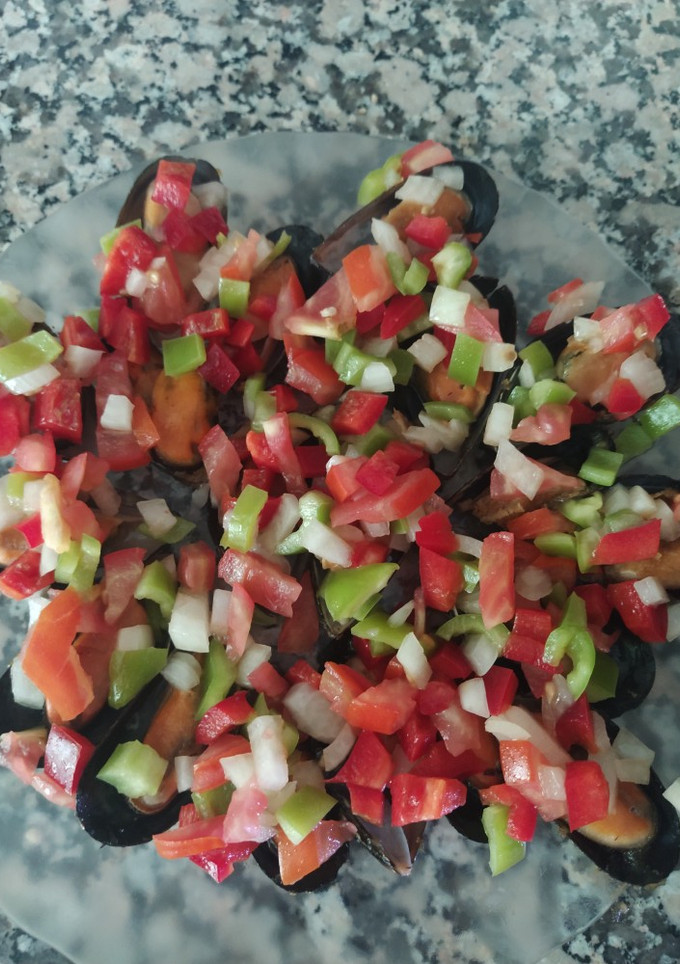 Una foto de Mejillones con pisto
