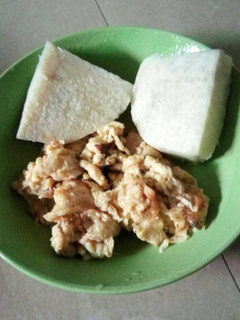 A picture of Boiled yam with scrambled egg.
