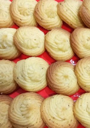 A picture of Happy world baking day. with butter cookies.