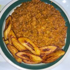 A picture of Porridge beans and fried plantain.