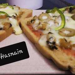Bread Pizza #ramadankitayari #FastFood A picture of Bread Pizza #ramadankitayari #FastFood.