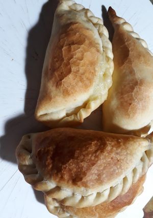 Una foto de Empanadas de cebolla, aceituna y muzzarela
