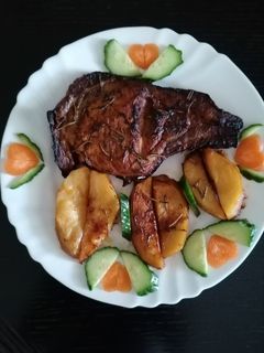 Φωτογραφία της συνταγής Μελωμένες μπριζόλες με πατάτες φούρνου