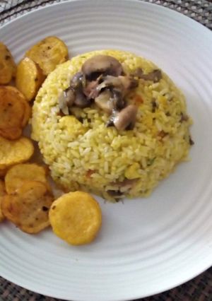 Una foto de Arroz con Pechuga de Pollo y Champiñones
