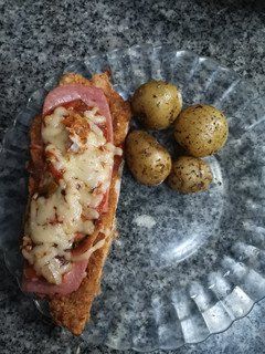 Una foto de Milanesas de cerdo a la parmesana