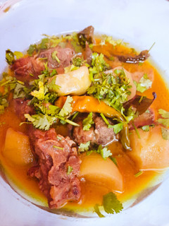 A picture of Tinday Gosht (round melon or baby pumpkin).