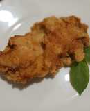Muslo de pollo deshuesado empanizado