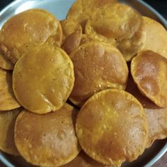 A picture of Tikhat poori for Aashadh month.