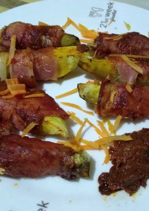 A picture of Sweet potato wrapped in bacon#kidsfavouritedish#Appetizzer.