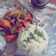 A picture of Dragon Chicken with fried rice.