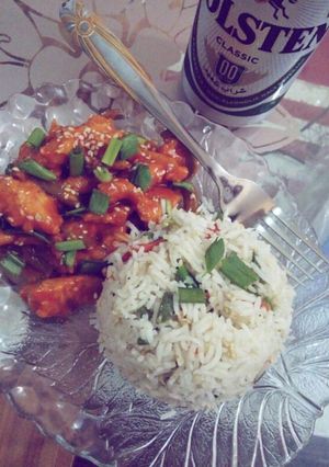 A picture of Dragon Chicken with fried rice.