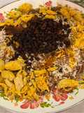 Percian noodle Rice (Reshte polo) with chicken fillet and Risins