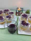Fruits creamy with pineapple jelly and black currant sauce