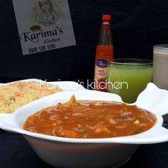 A picture of Stir fried couscous/corn beef soup.