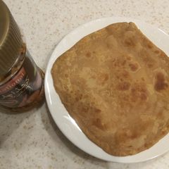 خستہ چوکور پراٹھا اچار A picture of خستہ چوکور پراٹھا اچار.