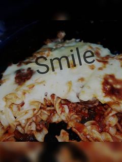 صورة لوصفة معكرونه بالبشاميل والبندوره بكرات اللحمه