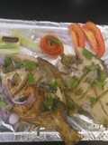 Green masala stuffed fish pomfret