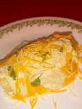 Chimichangas w/ spicy avocado cream and queso