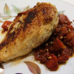 A picture of Chicken Puttanesca.