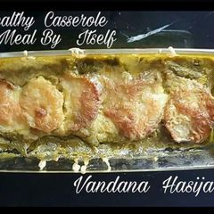 A picture of Dal Palak Potato Cheese Baked Casserole.