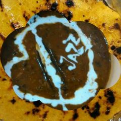 Dal makhani with makki roti A picture of Dal makhani with makki roti.