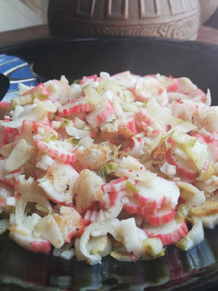 Una foto de Surimi al ajillo con endivias 🦀🍃