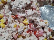 Una foto de elotes a la mexicana