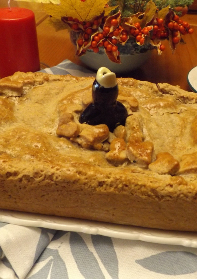Una foto de Pie de manzana con almendras y nueces