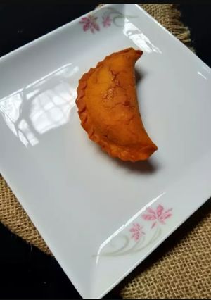 তালের রসের ভাজা পুলি পিঠা রেসিপির প্রধান ছবি