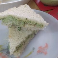 A picture of Peanut sandwiches with muli ki kashmiri chutney.