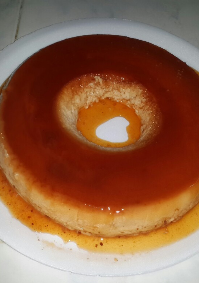 Una foto de Budín de pan !!🍮🍮