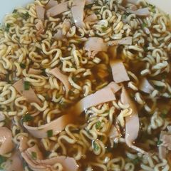 A picture of Beef Ramen with Black Forest Ham and Chives.
