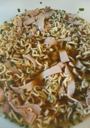 A picture of Beef Ramen with Black Forest Ham and Chives.