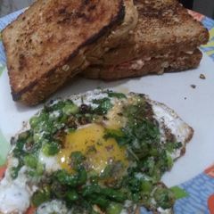A picture of Multigrain & Half Fry Egg.