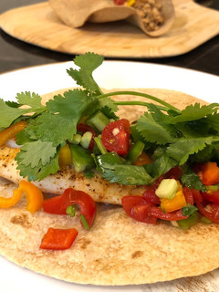 A picture of 🌮Tilapia tacos with simple salsa 🌮.