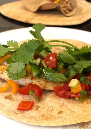 A picture of 🌮Tilapia tacos with simple salsa 🌮.